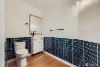 Large main floor bathroom with room to add W/D or shower in the future