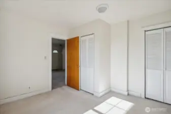 Bedroom on main floor with 2 walk in closets