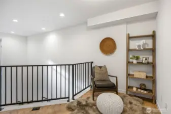 Third level, has room for a reading nook, office perhaps (Your vision here!) Photo is of model home of same floorplan. Color schemes of finishes may vary.
