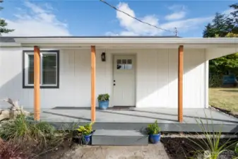 Fresh exterior paint, porch posts, landscpaing