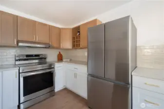 Tons of counter space on the New Quartz countertops with tile backsplash