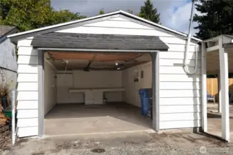 Spacious garage with work bench