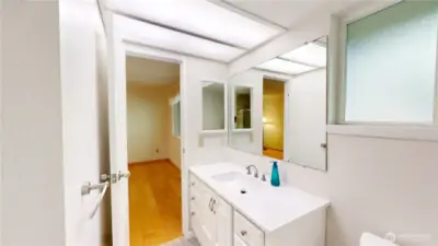 The primary en suite is a 3/4 bath with walk-in shower and newer vanity.