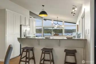 barstools facing the lake