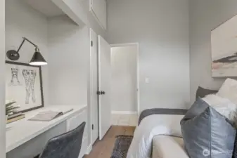 upstairs bedroom or home office showing the desk