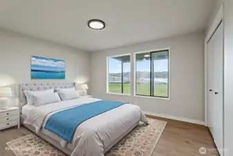 downstairs bedroom facing the lake virtually staged
