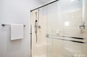 Room for two in this shower with dual showerheads.