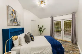 Step directly into your own secret garden from this peaceful guest room.