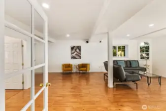 The full lower level lives like its own residence—complete with a second kitchen and private entry—ideal for guests, multi-generational living, or a stylish income suite.