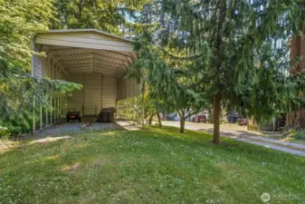 Covered RV Parking and long driveway for ample privacy!