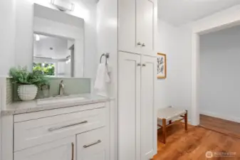 Half bathroom with custom built-in storage