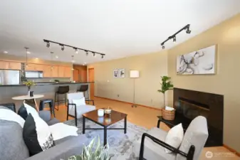 Nice Maple wood floors, fireplace, breakfast bar.