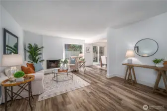 Step inside and take it all in! Notice the new flooring, Milgard windows, fresh interior paint and abundant natural light!