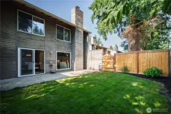 Enjoy a fully fenced backyard with a patio—perfect for entertaining or gardening.