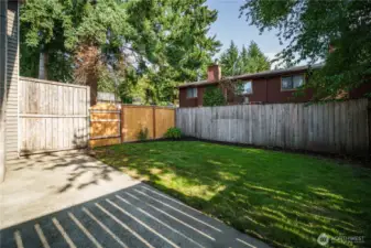 Gates on both sides allow easy access for lawn care. The HOA mows your lawn for you. No mowing needed—just add your own plantings!