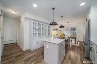 Off the hallway near the entry, you’ll find the updated guest powder room.