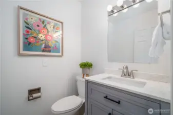 The tastefully remodeled powder room.