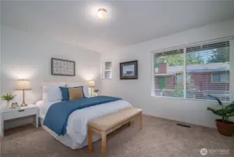 Upstairs, retreat to the spacious primary suite.