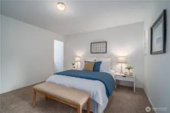 The primary bath is located through the door on the left side.