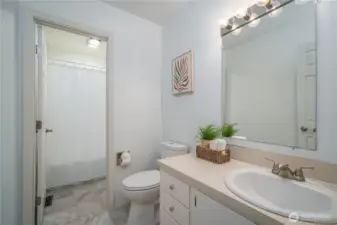 The upstairs full hall bath.