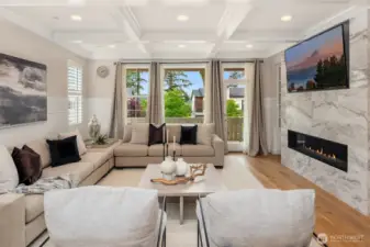 Grand living room opens up to covered front porch. Sip your morning coffee, and start a bright day on this beautiful porch!