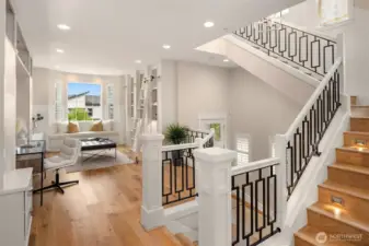 No details overlooked with premier iron railing and stair lighting.