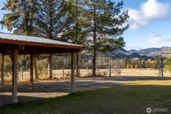 2-bay carport and ample parking.