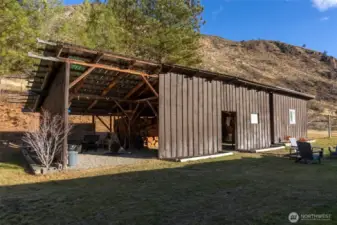 Includes an open bay and secure room at one end.