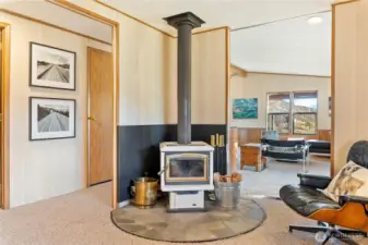 A wood stove in the den/study add to wintertime coziness