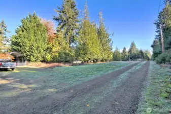 Coming up the driveway passed the first neighbor. Three homes share this gated entry driveway off of South Island Drive.