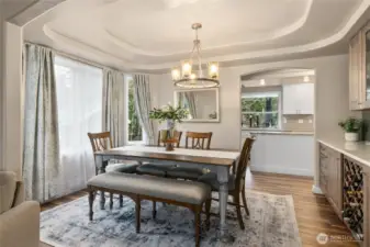 Formal dining room flowing off the kitchen and formal living room.