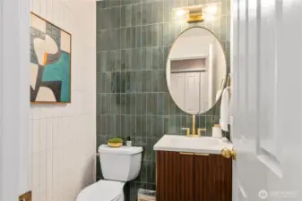 Half bath on main floor with beautiful finishes.