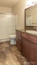 The ensuite bath has lots of storage!