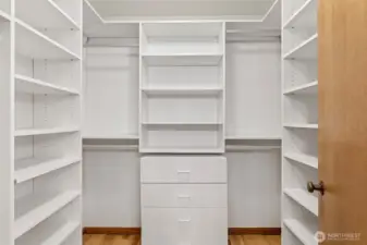 Walk in closet with formal organizing system!