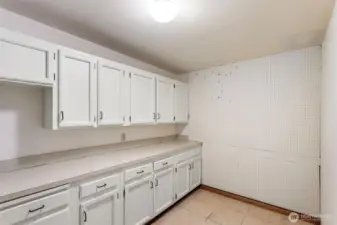 Unheard of --- a large utility room with storage in the unit.
