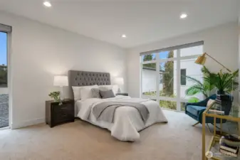 The generous primary bedroom, lives like a brand new home with all finishes very lightly lived in. Plenty of room for a king bed + large side tables + seating area.