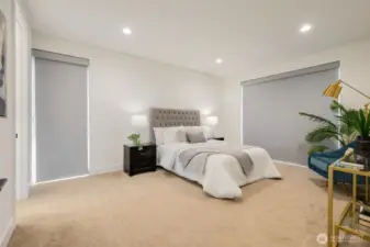 Remote Lutron blinds make it super cozy and hotel like inside the primary.