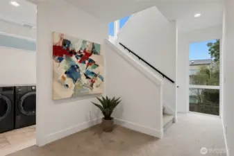The stairwell and landings are bathed in light, making it feel so inviting in every space. The 2nd floor landing is also large enough for an office set up, pet corner or more storage space.