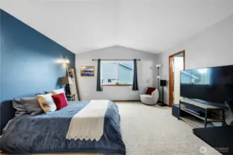 Primary Suite with lake and mountain views