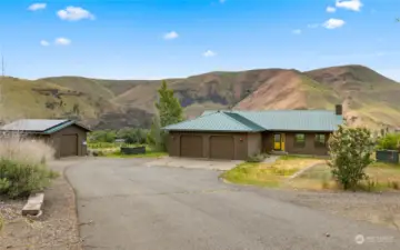 3 bedrooms, 3 bathrooms and 3 covered parking garage stalls make this rambler a rare find.  Add in the just over 10 acres it sits upon and you now have your own private oasis.