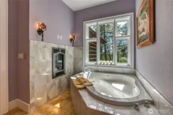 Soaking tub with fireplace