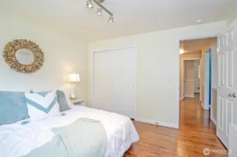 From the primary suite, enjoy a clear view into the hallway for easy access to the rest of the home.