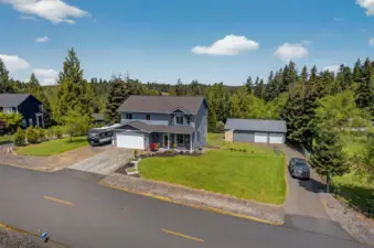 Front of House With RV Storage and Shop
