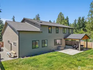 Flat, usable, fully fenced backyard. Double gate and side vehicle parking off side of house.