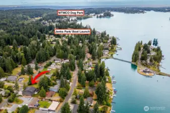 Proximity waterfront dog park and to Jenks Park with boat launch, playground, lake access, pickle ball, tennis and sports courts.