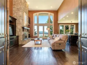 Grand entry. Vaulted ceilings. Statement fireplace.