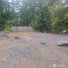 View from upper side of lot looking toward driveway entry.