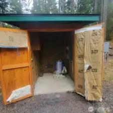 Insulated pump house also has the router for the Rockisland Fiber Optics hookup. A hard-wired wall heater is installed to keep inside of pump house warm in winter months.