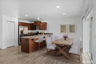 Virtually staged dining area and kitchen
