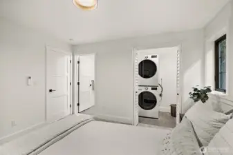 ADU bedroom with bathroom and own laundry set up.